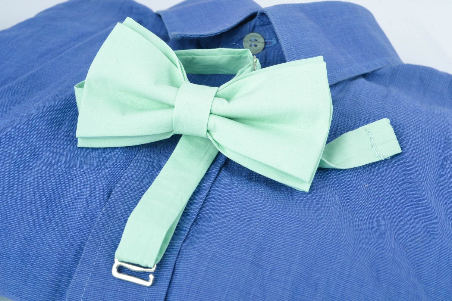 Fabric bow tie of light turquoise color photo 1