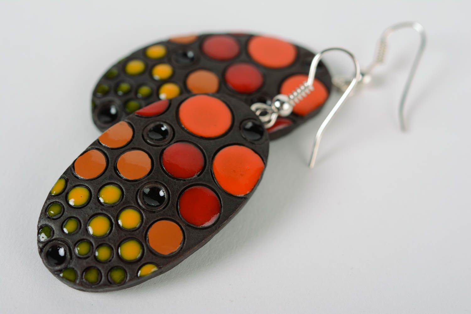 Handcrafted designer unique ceramic earrings with colored enamel paintings   photo 2