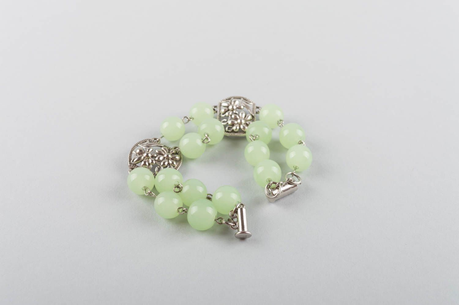 Beautiful gentle green handmade metal bracelet with natural nephrite stones photo 3