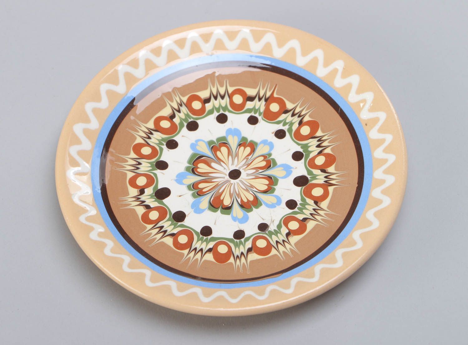 Small handmade clay saucer with beautiful color painting in ethnic style photo 3