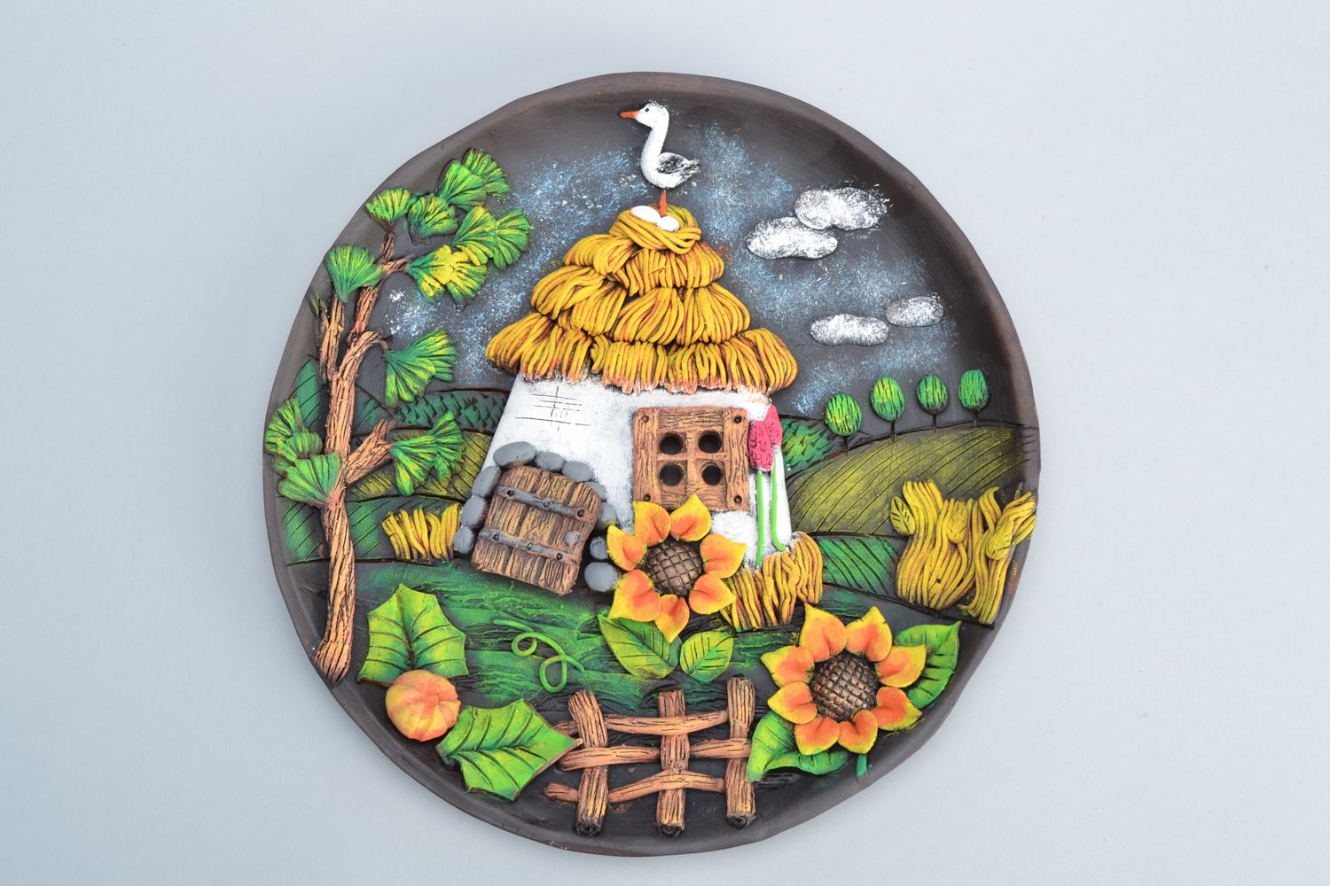 Assiette décorative murale ronde en céramique faite main photo 1
