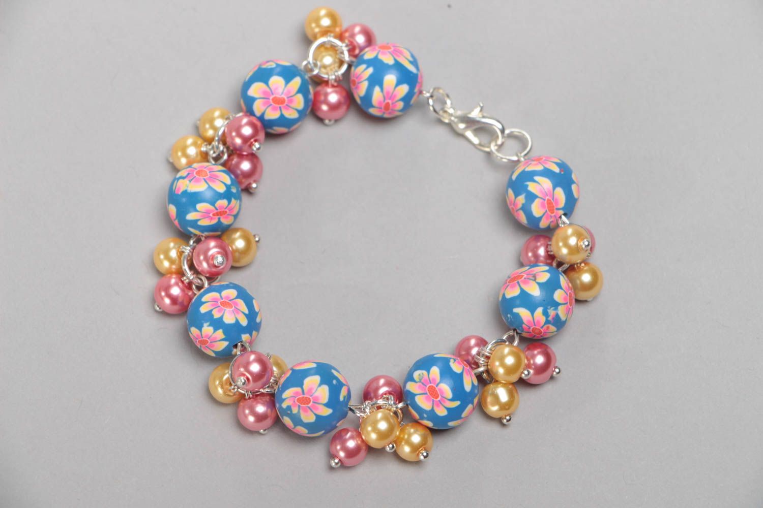 Colorful handmade children's plastic bead bracelet with ceramic pearls  photo 3