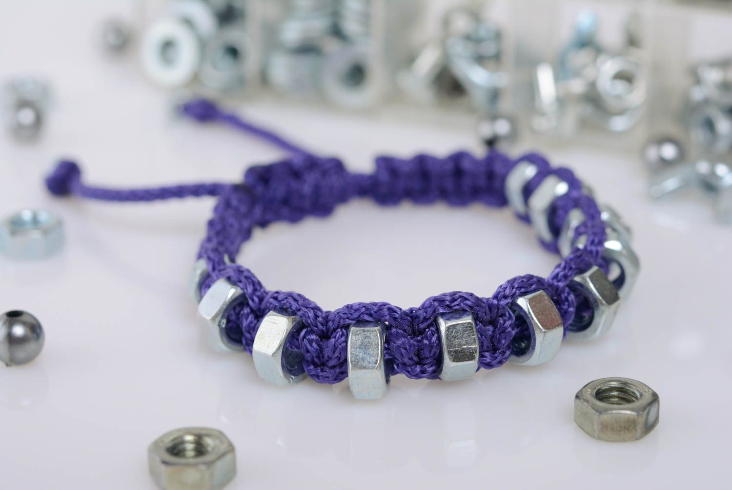 Handmade macrame bracelet made of cord and screw nuts blue drawstring accessory photo 1