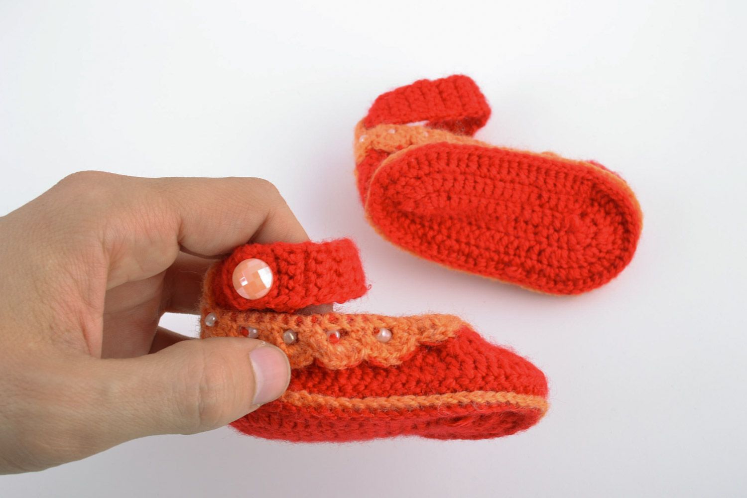 Handmade red knitted cotton baby booties in the shape of sandals  photo 2