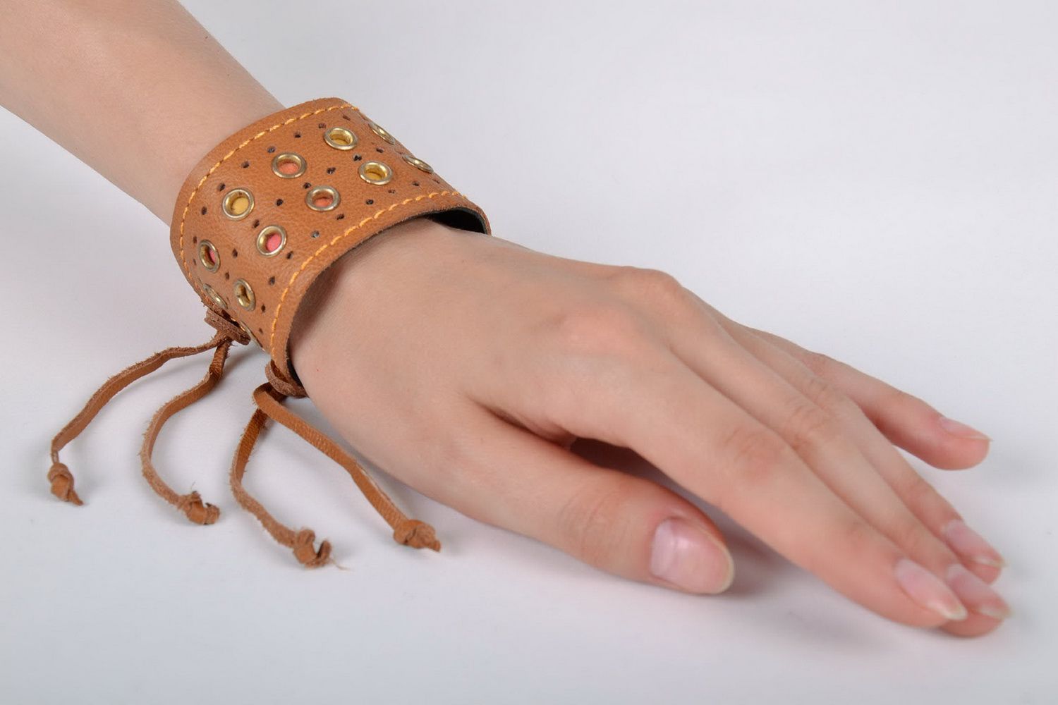 Brown leather bracelet with rivets photo 5