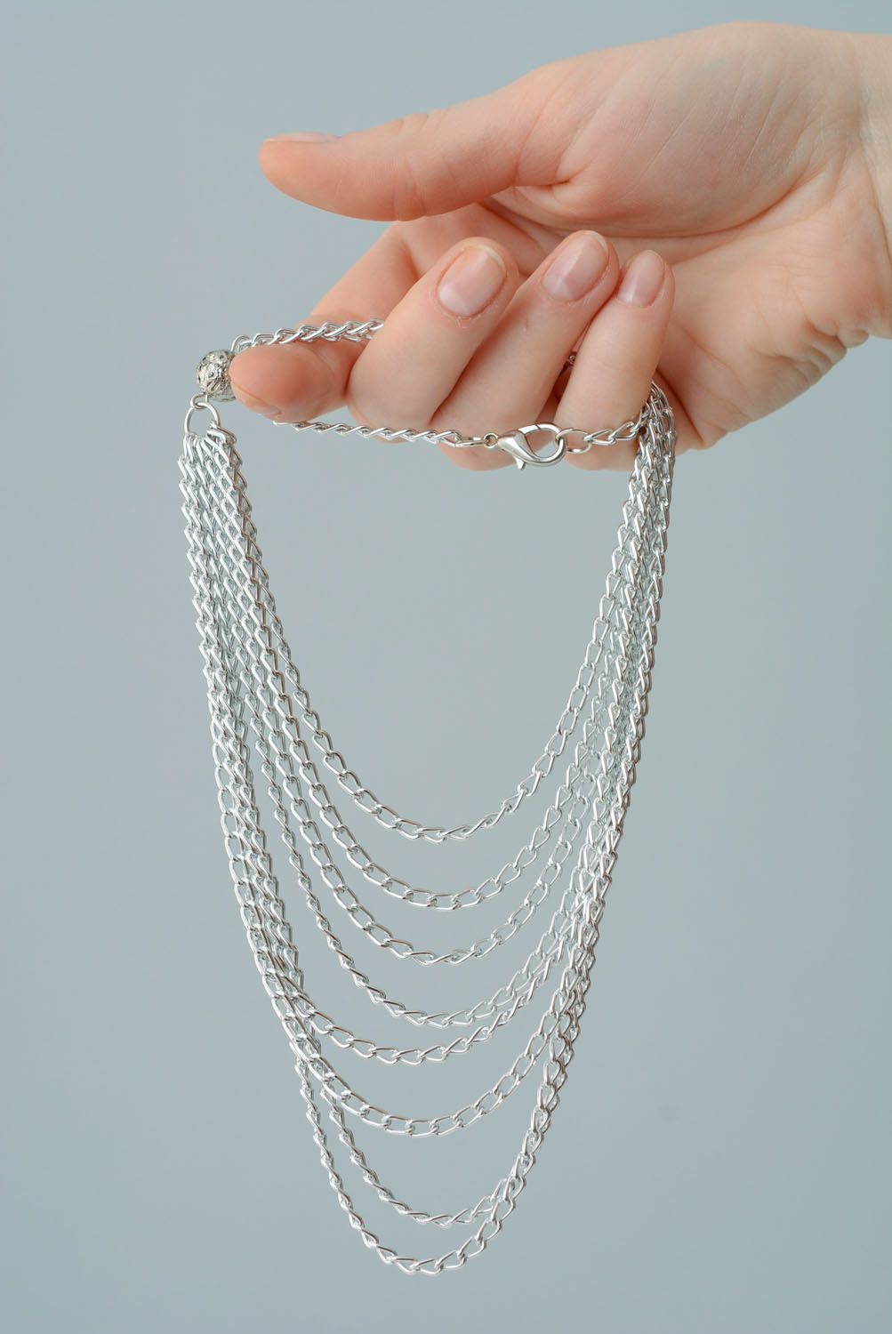 Women's necklace made of chains photo 5