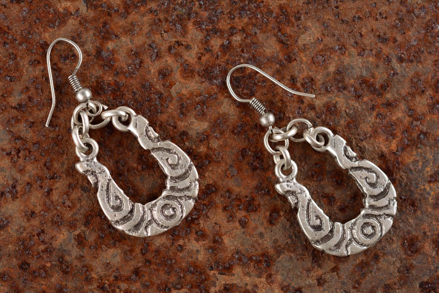 Metal ethnic earrings photo 1