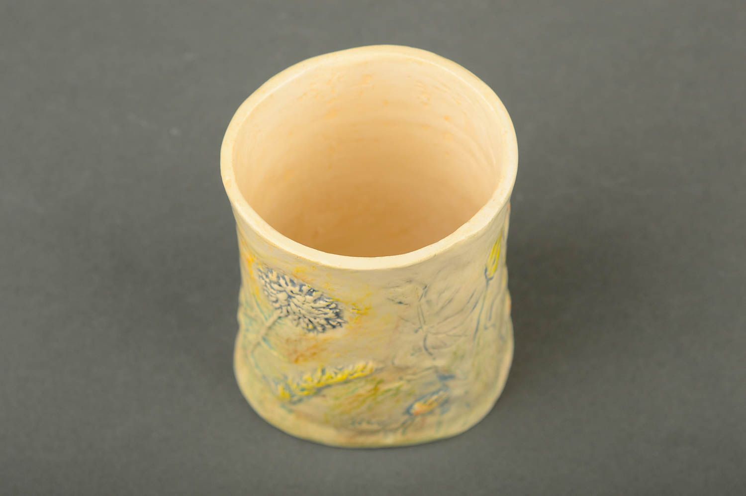 Ceramic glazed yellow color drinking cup with no handle and field flowers pattern photo 4