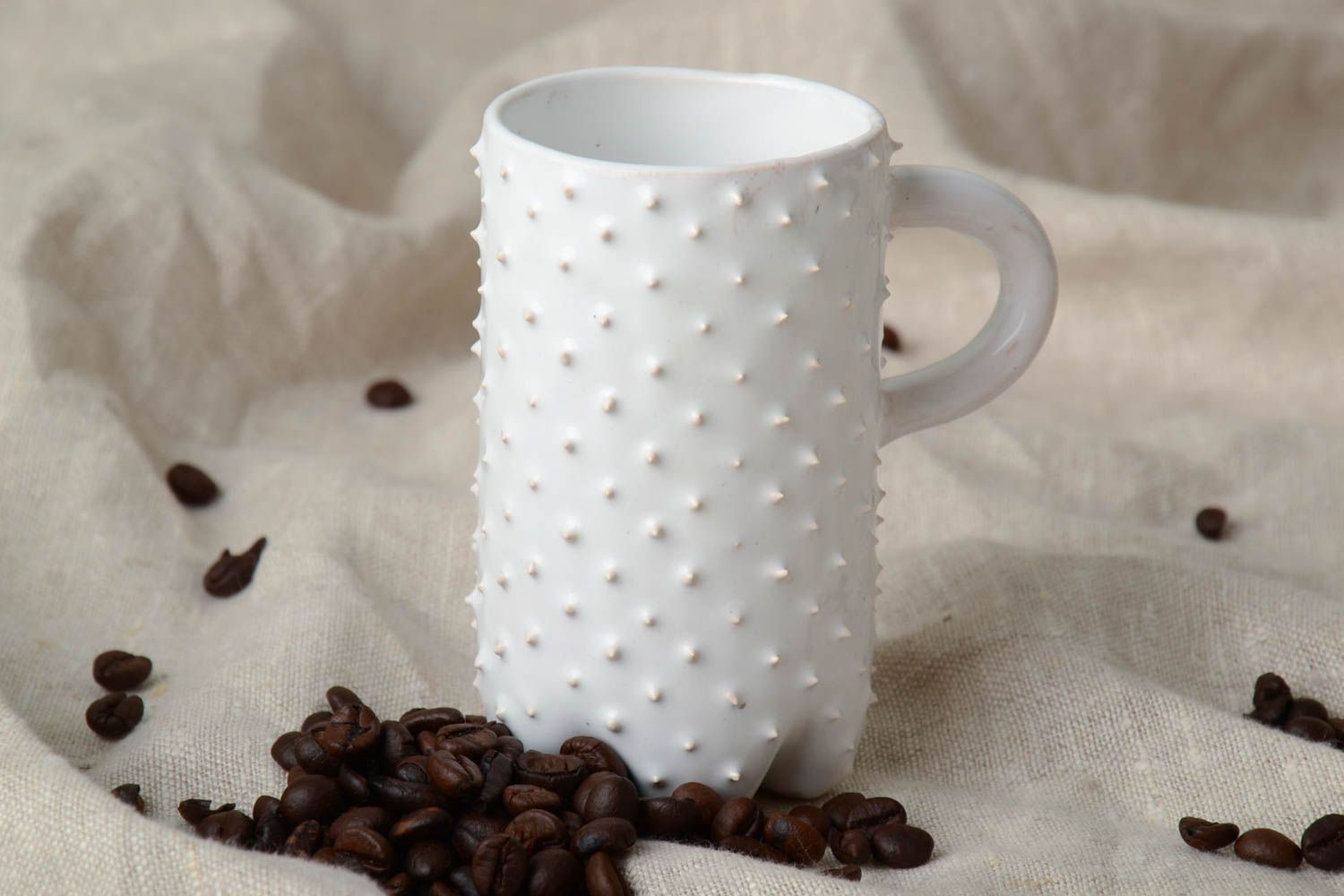 White tall ceramic coffee 11 oz cup covered with thorns with handle photo 1
