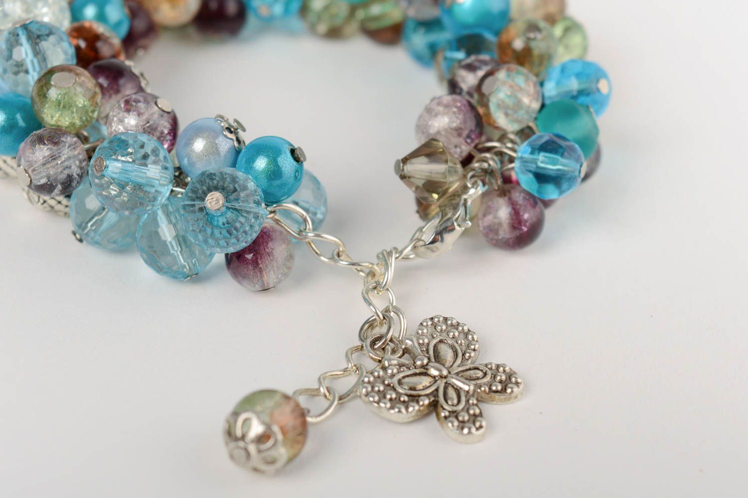 Handmade festive beautiful bracelet made of crystal and glass with charms photo 3