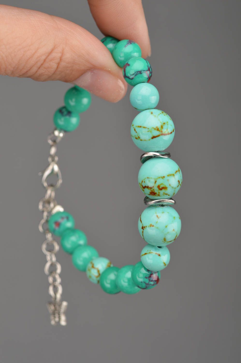 Handmade stylish bracelet on fishing line made of beads of turquoise color photo 2