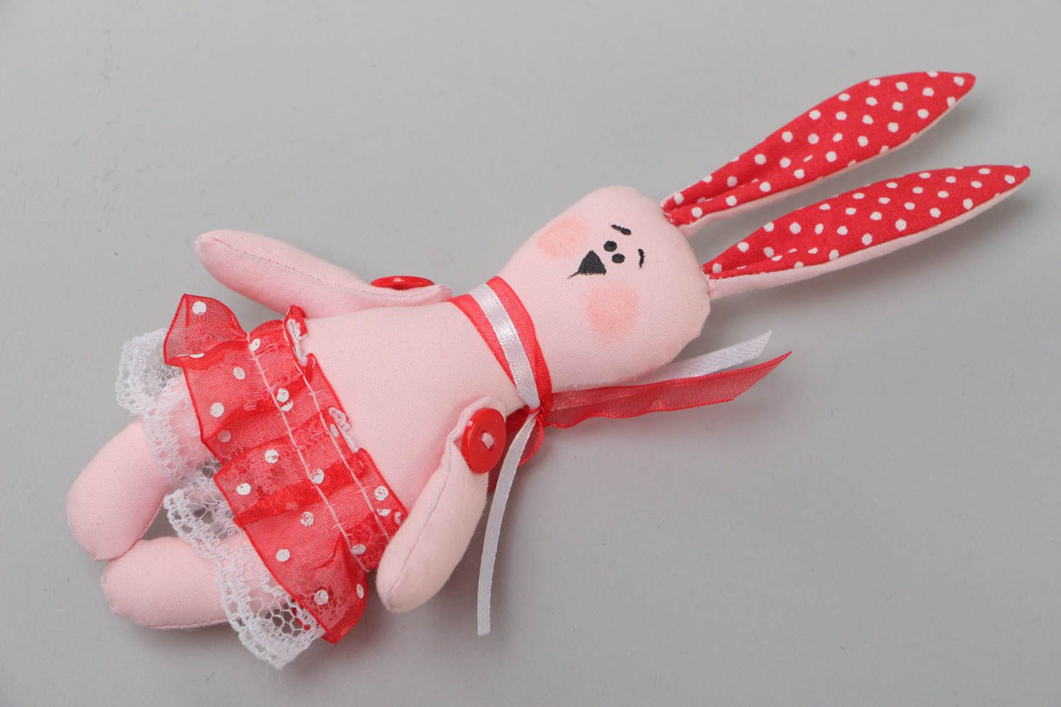 Handmade small cotton fabric soft toy pink rabbit in red skirt for children photo 2