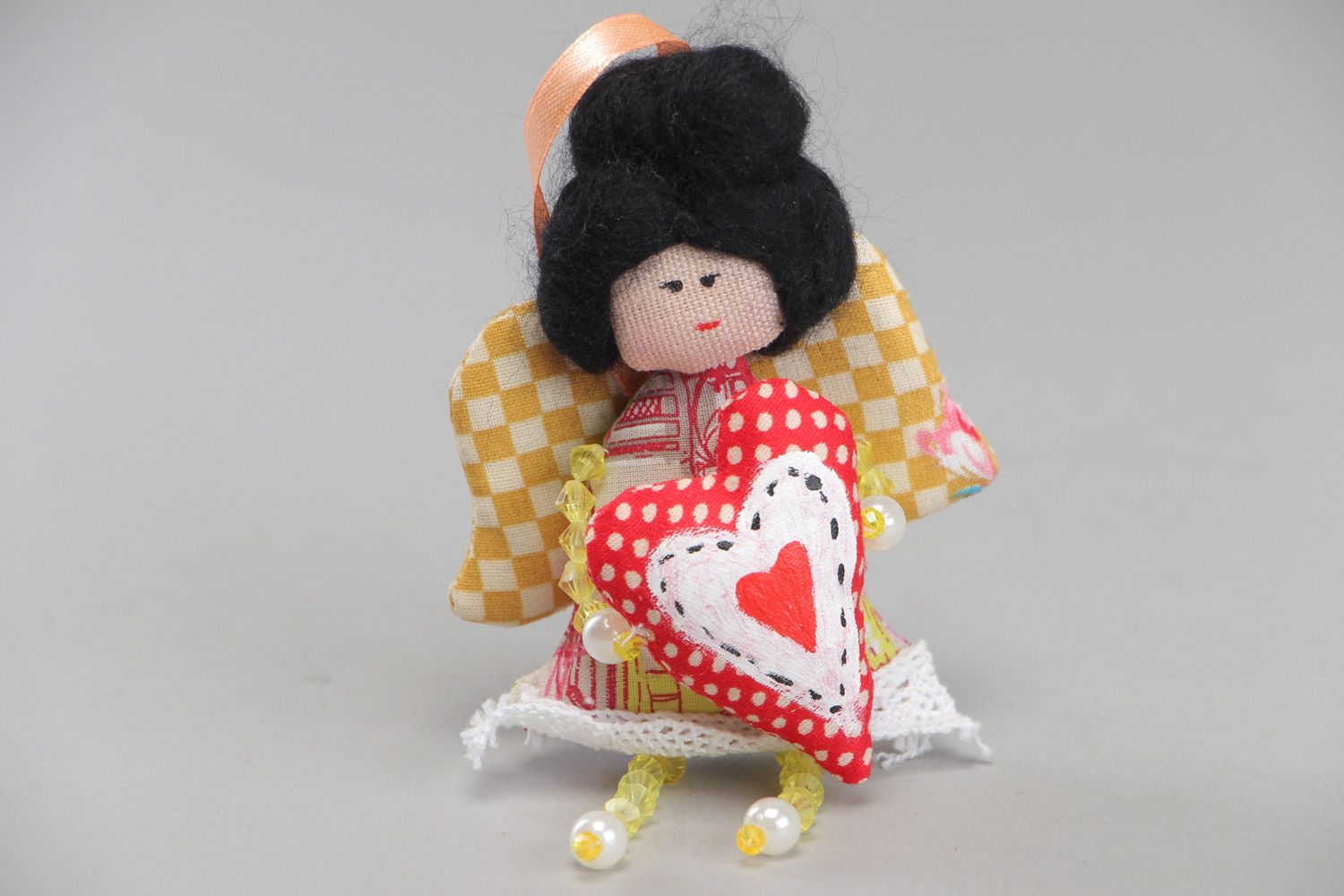 Künstlerische weiche handmade Puppe aus Texti mit Öse foto 1