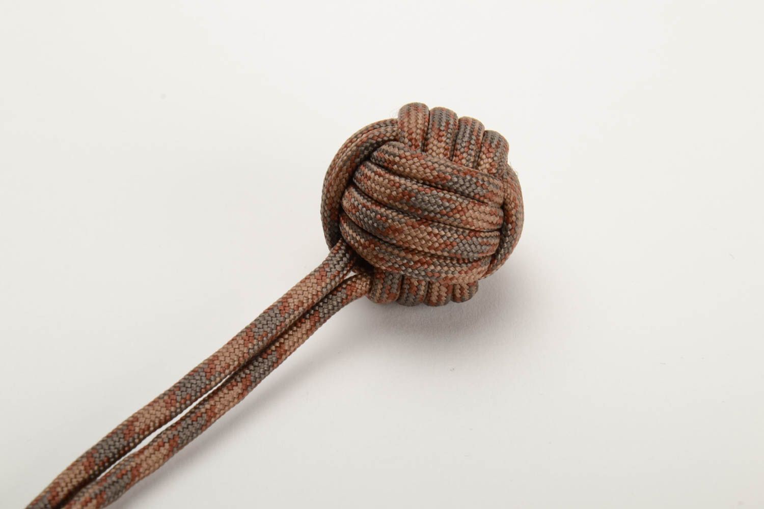 Men's brown handmade keychain woven of American paracord photo 3