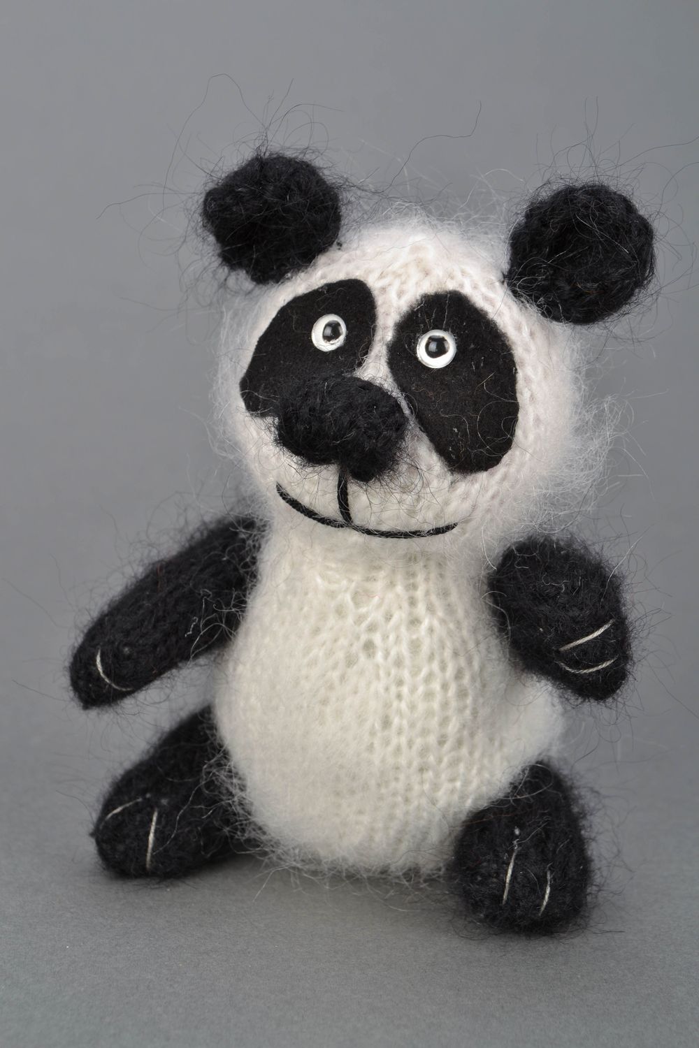 Gehäkeltes Spielzeug Pandabär foto 1