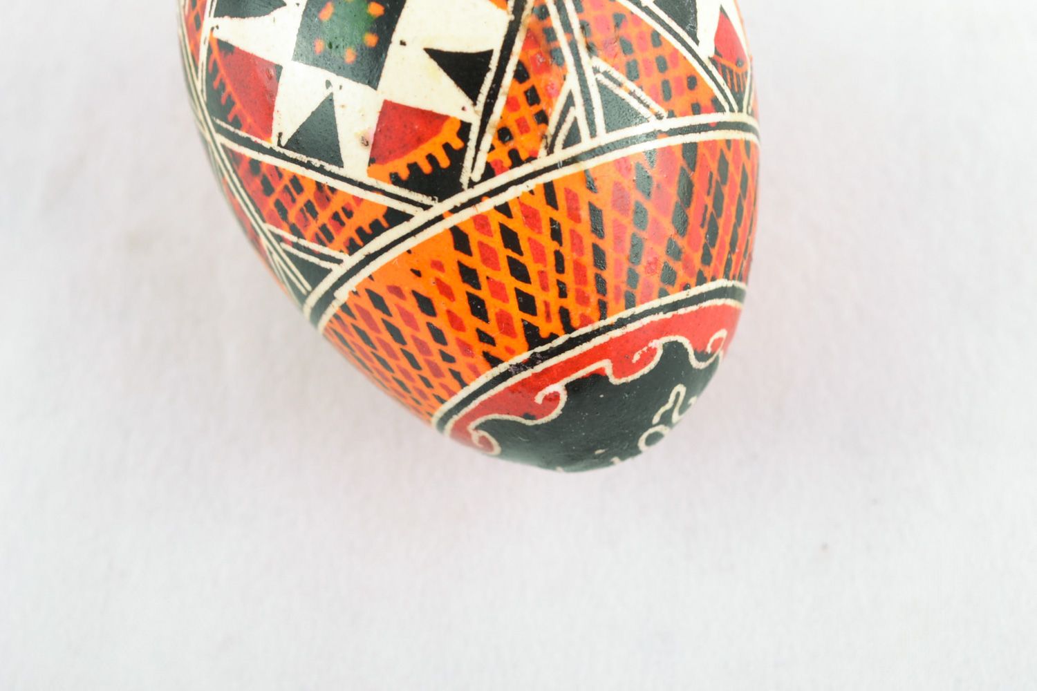 Traditional Easter egg pysanka with handmade painting made using wax technique photo 3