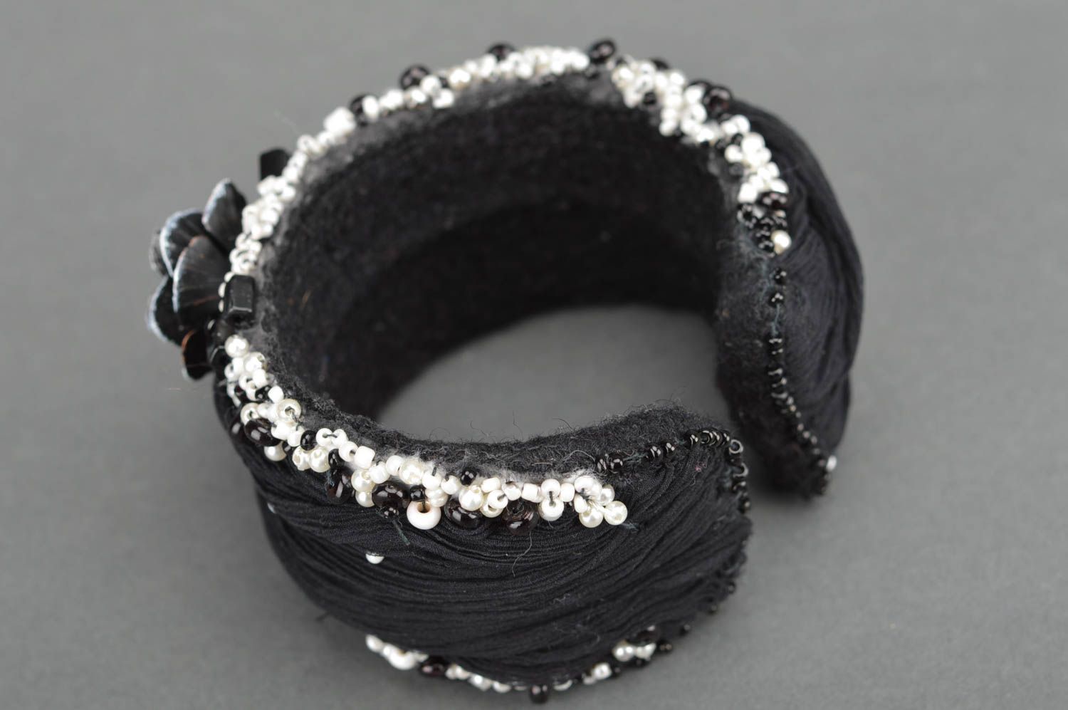 Fabric handmade wide bracelet in black color decorated with flower and beads photo 5