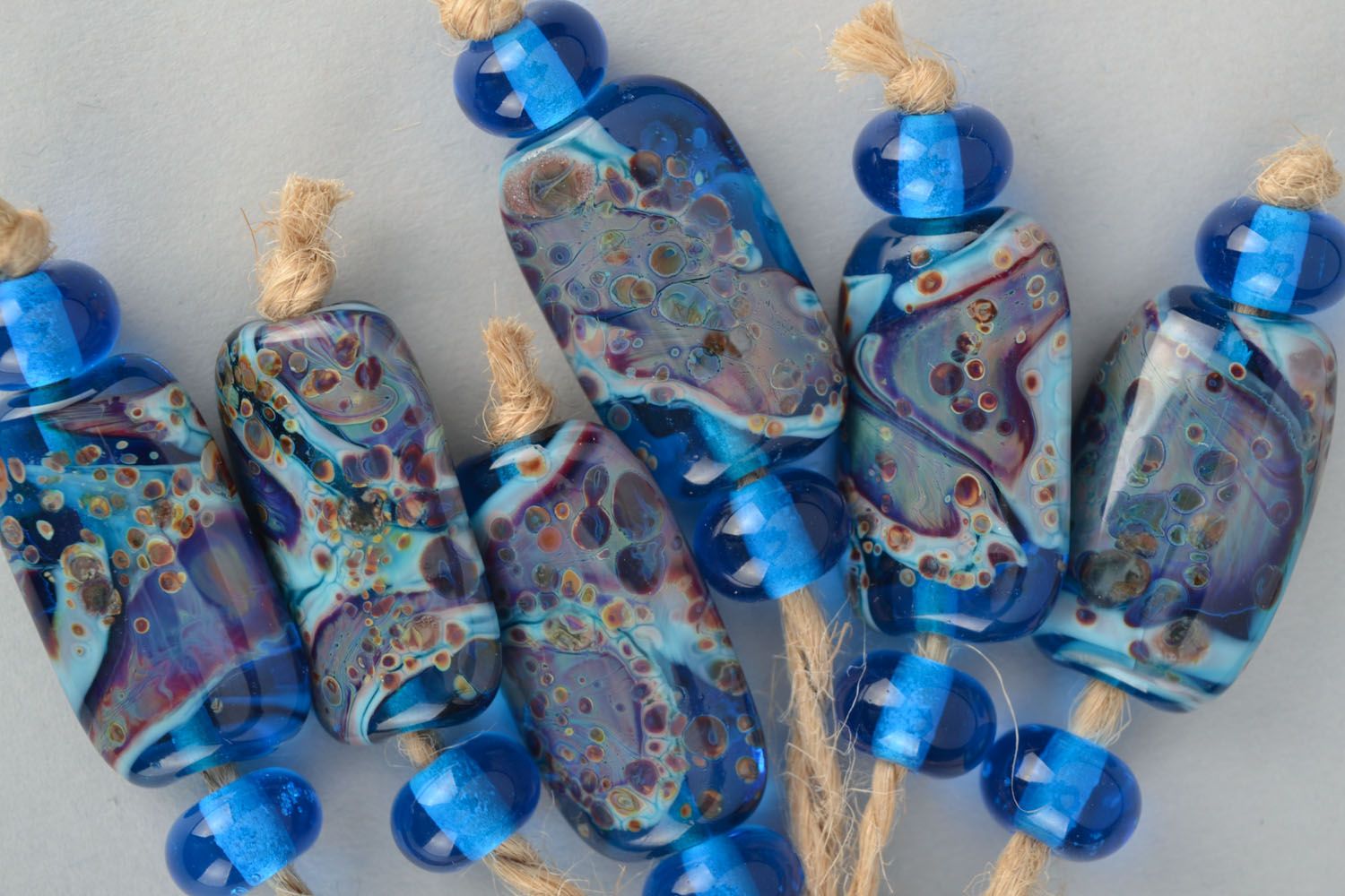 Handmade glass beads of blue color photo 2