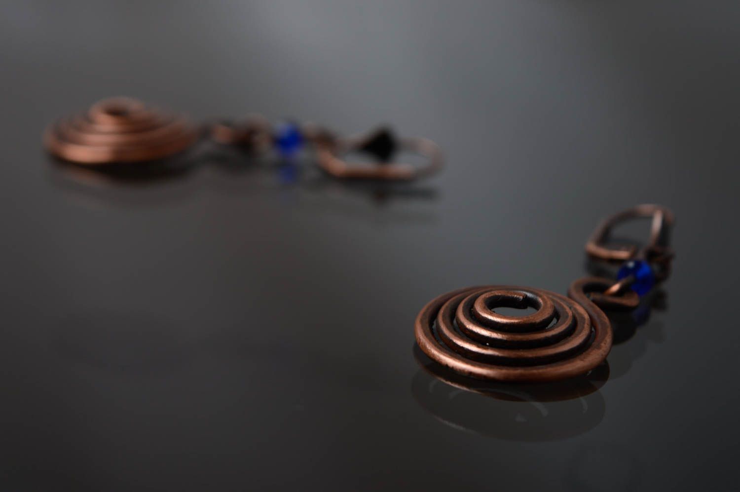 Copper wire wrap earrings in the shape of curls photo 3