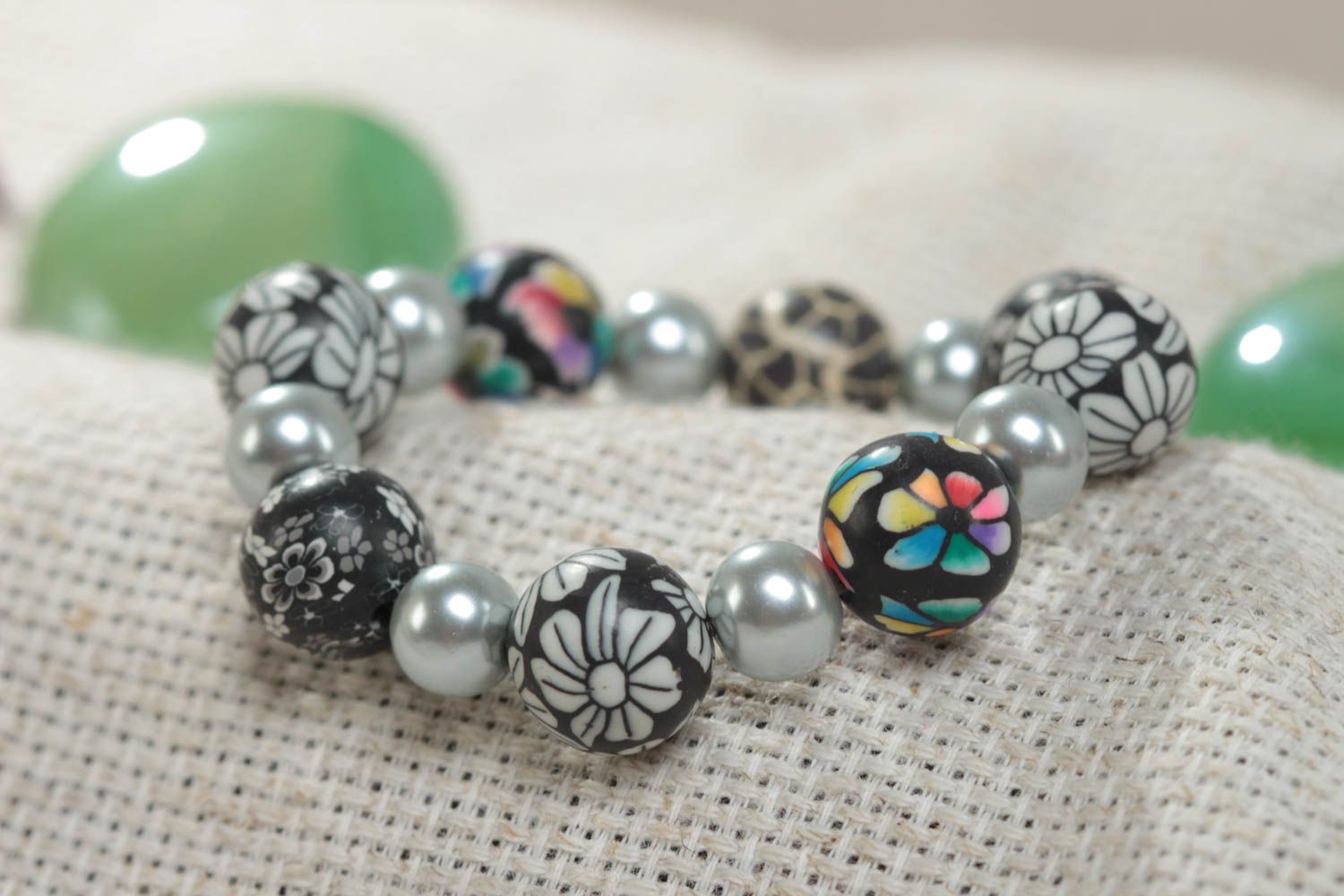 Beautiful gray handmade designer children's plastic bracelet with ceramic pearls photo 1