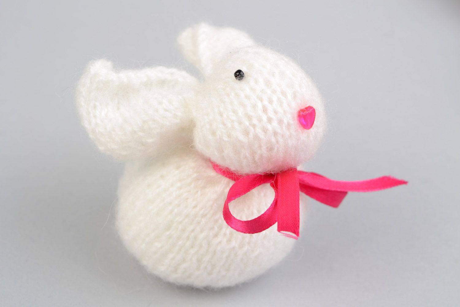 Handmade soft toy knitted of angora wool in the shape of white rabbit with pink bow photo 5