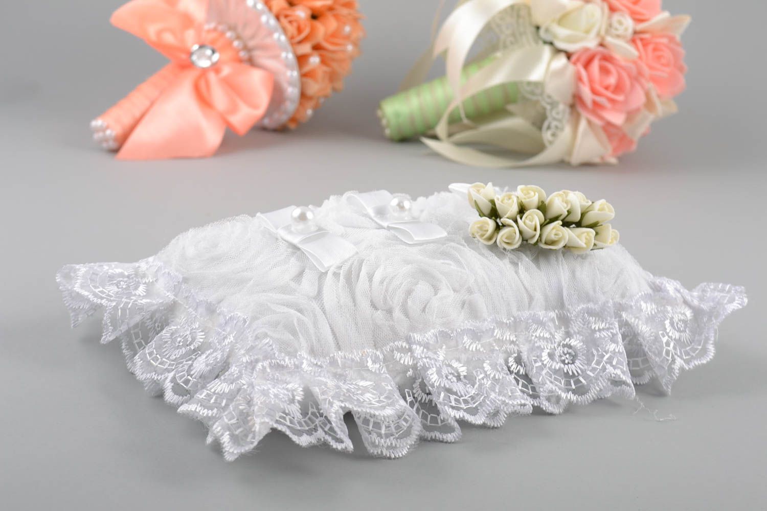 Beautiful rectangular white handmade wedding pillow for rings with flowers photo 1