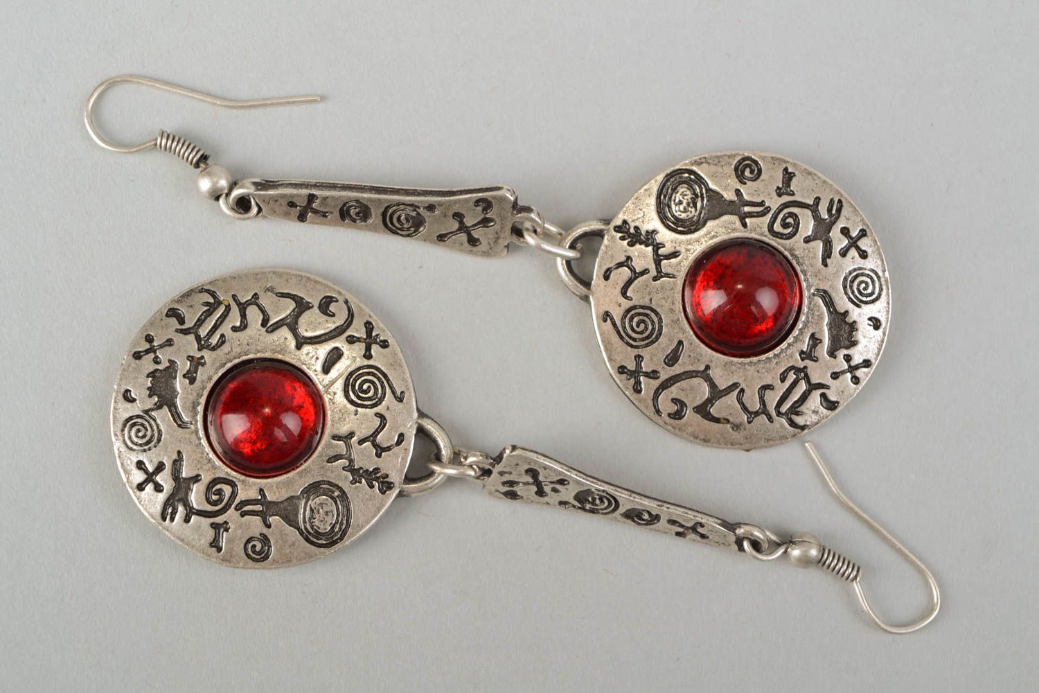 Long metal earrings with red cabochons photo 3
