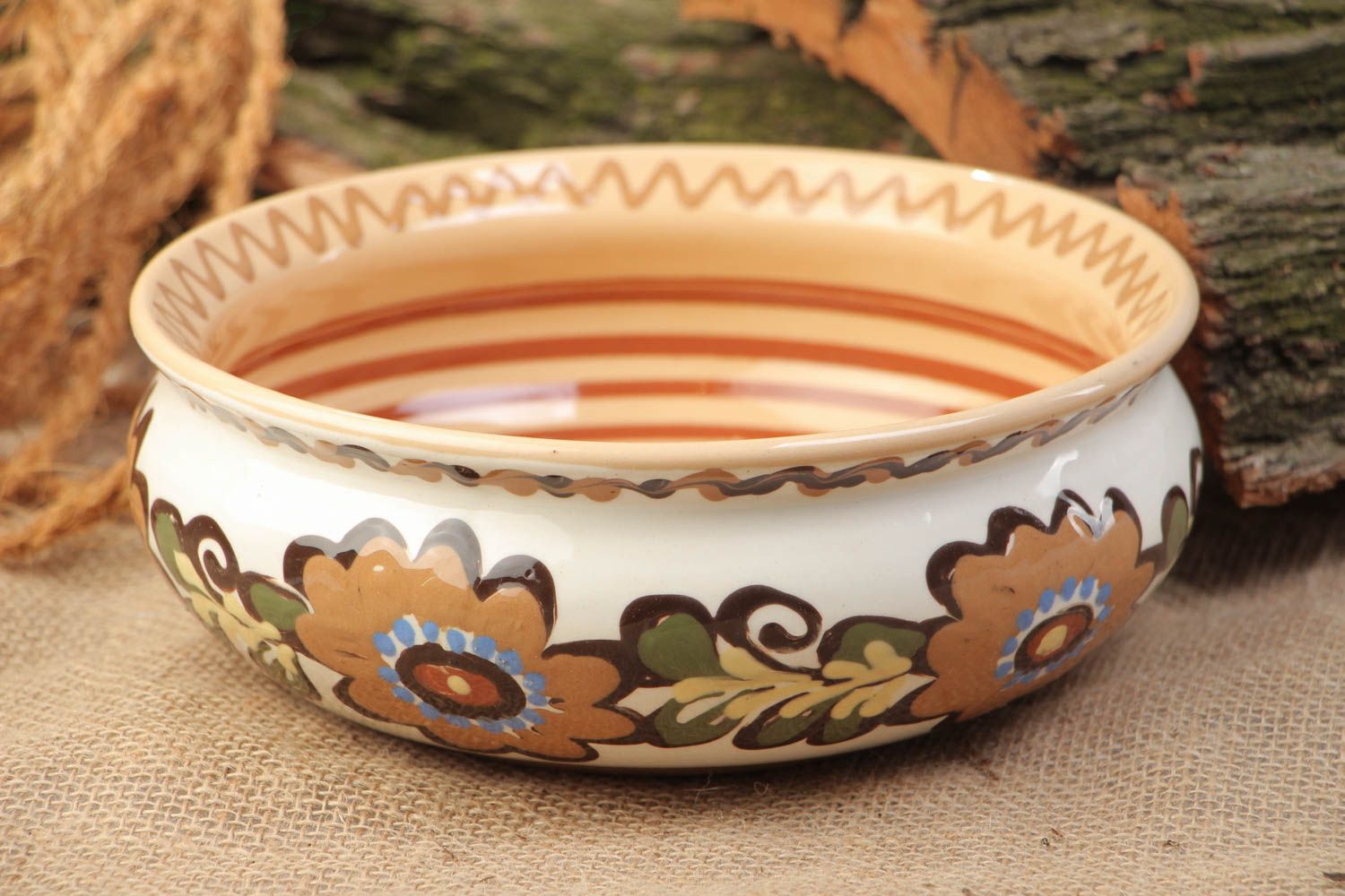 Handmade designer ceramic bowl for 1.3 l painted with colorful glaze with flowers photo 1