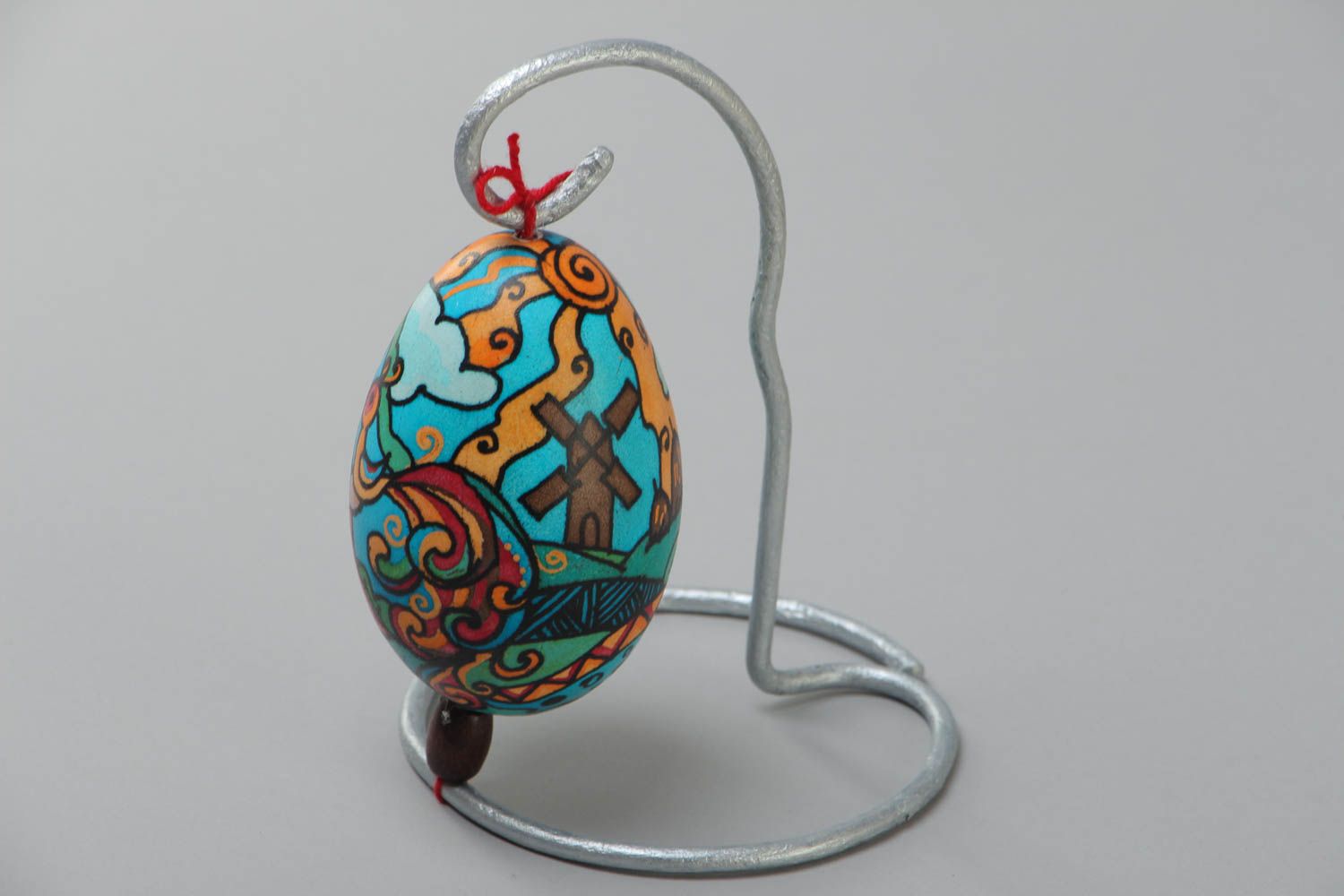 Расписное яйцо на подставке гусиное в восковой технике ручной работы с украинкой фото 4