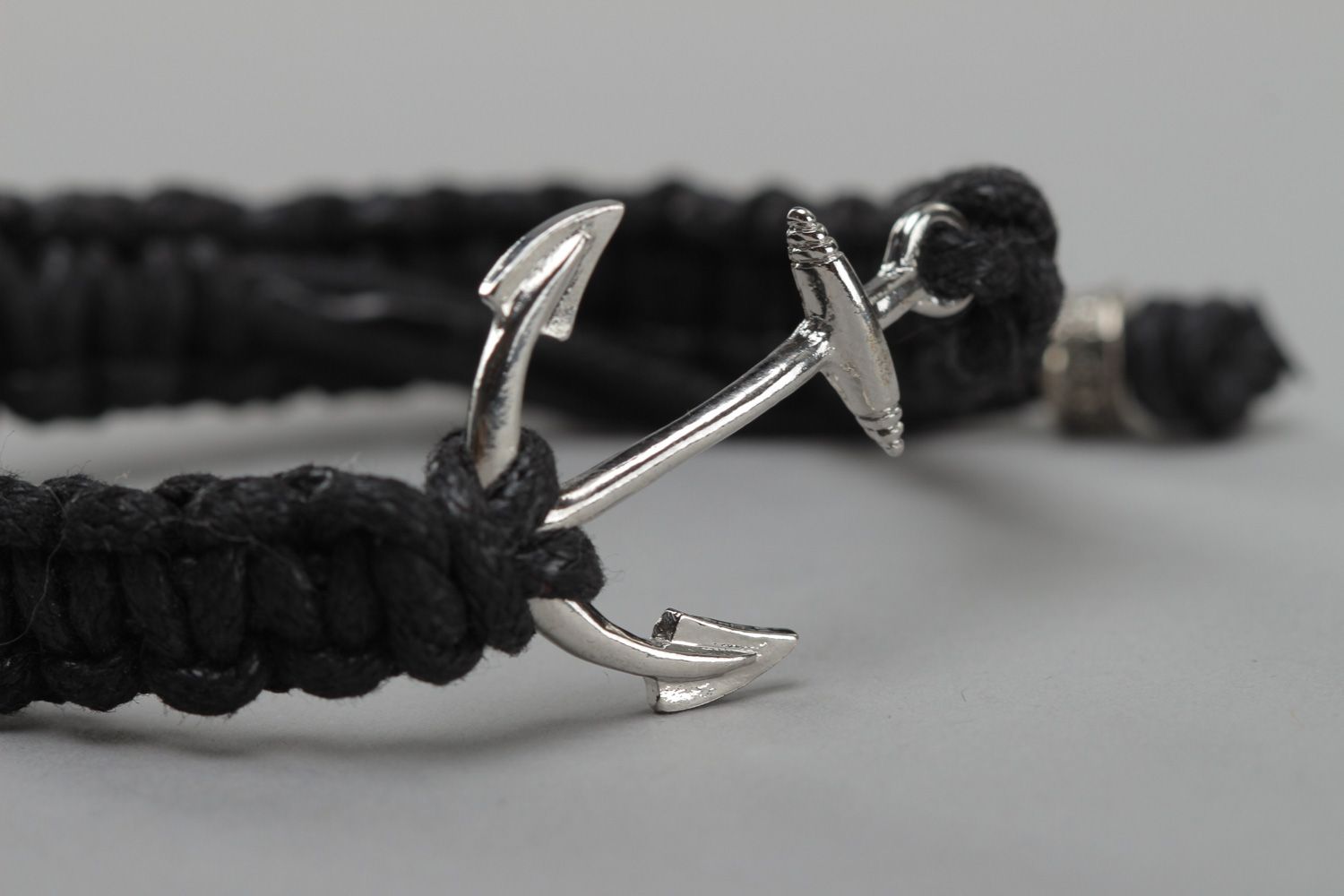 Handmade designer friendship bracelet woven of waxed cord with anchor charm unisex photo 3