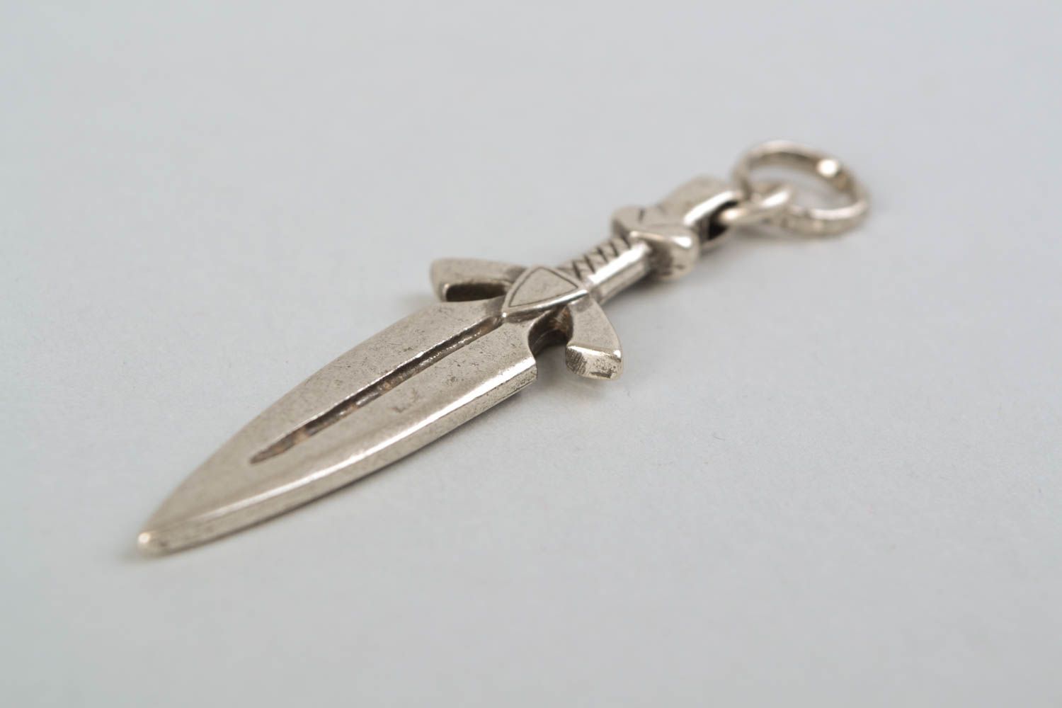 Metal pendant in the shape of sword photo 4