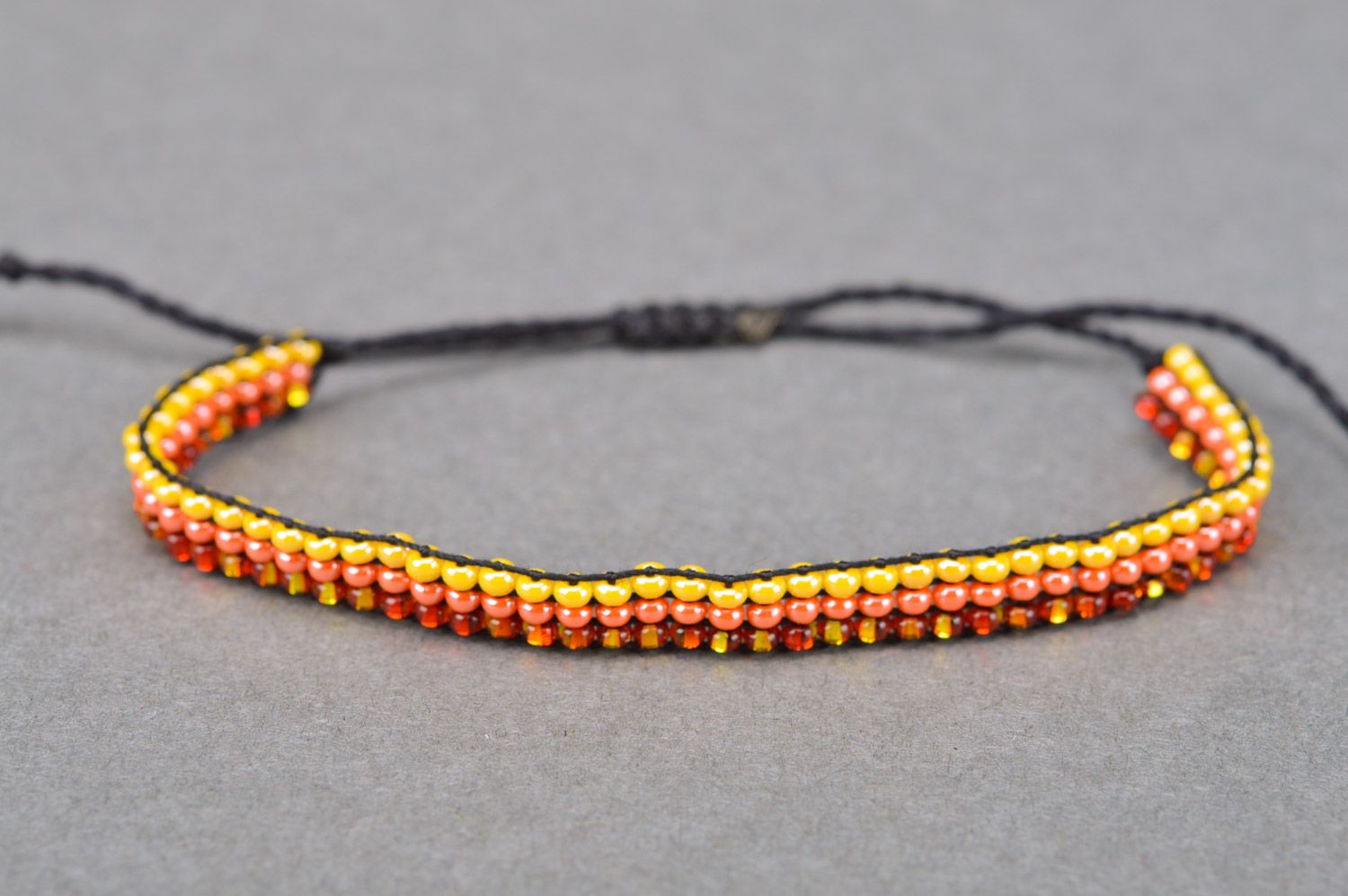 Handmade woven thin beaded wrist bracelet of three colors for girls photo 2