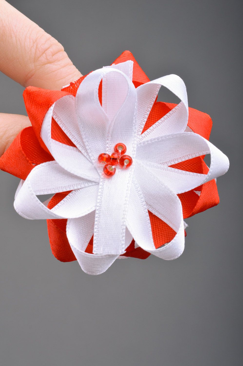 Handmade decorative hair tie with flower sewn of red and white satin ribbons  photo 3