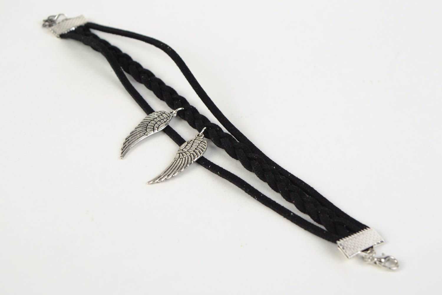 Stylish black handmade suede cord bracelet with metal charms in the shape of wings photo 5