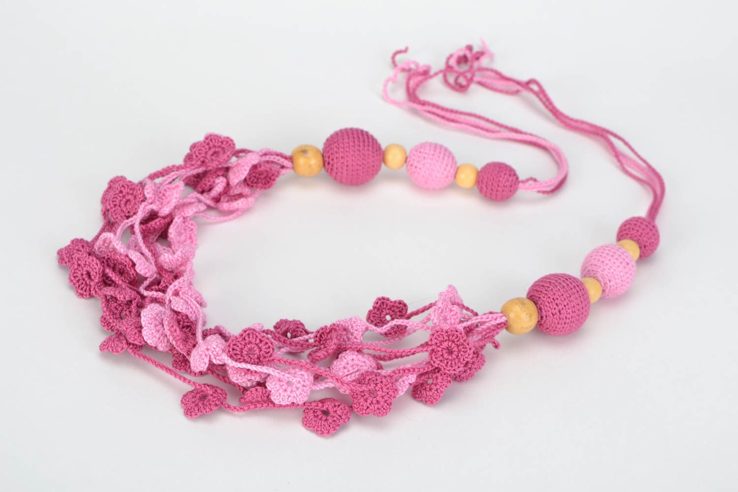 Handmade wooden bead necklace crocheted over with cotton threads of pink color photo 3