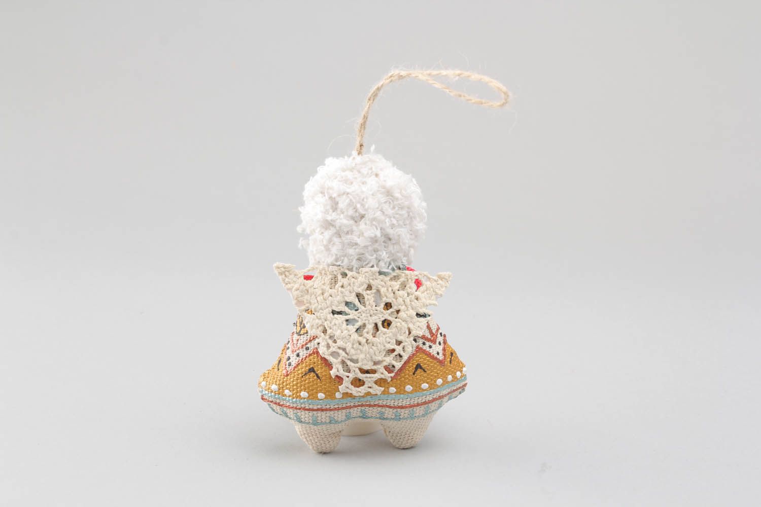 Pingente decorativo feito de tecido preenchido com trigo mourisco e processado com baunilha foto 4