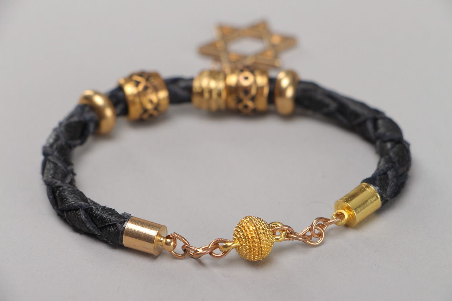 Handmade wrist bracelet woven of genuine leather with metal charm Star of Judah photo 4