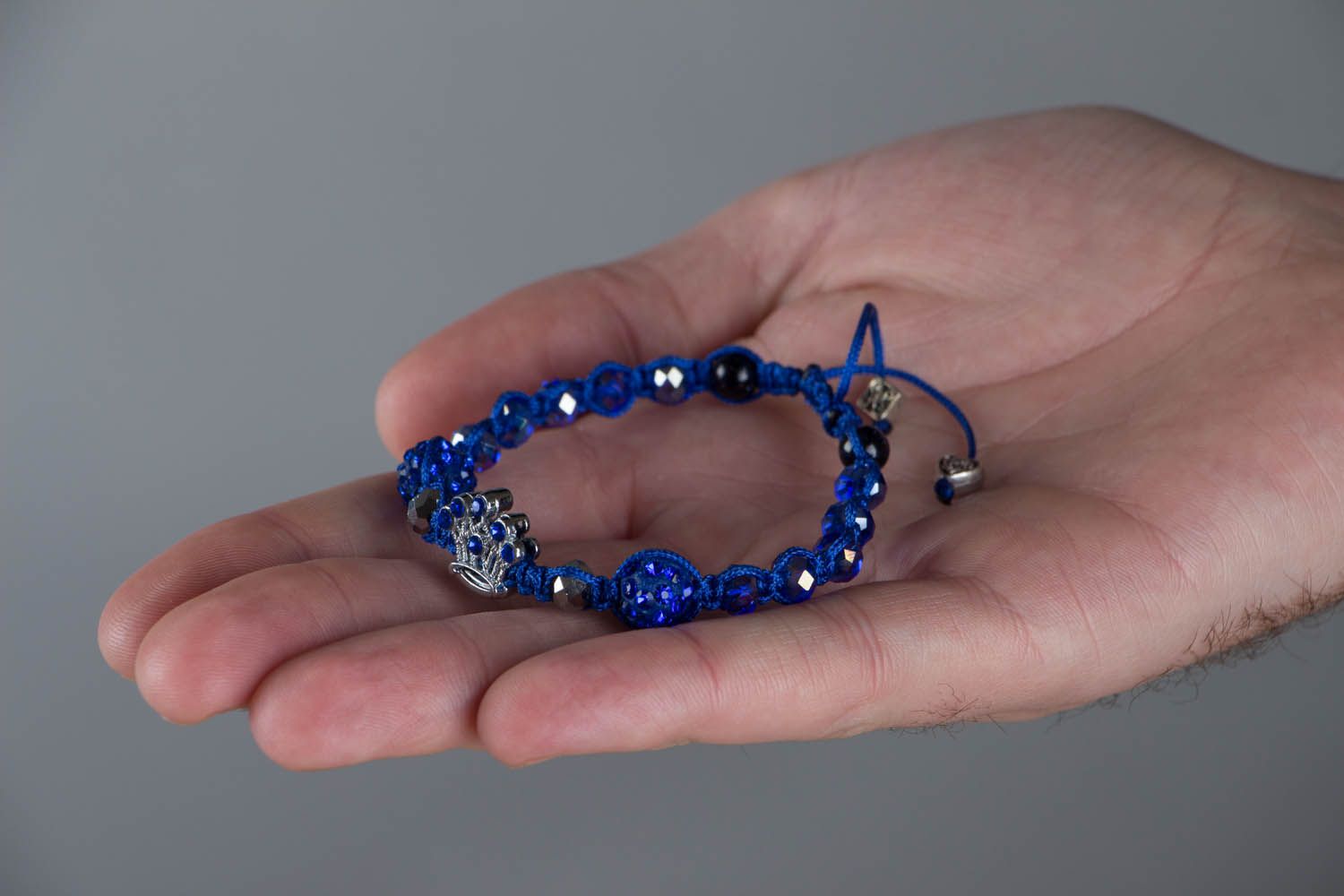 Thread bracelet with glass photo 4