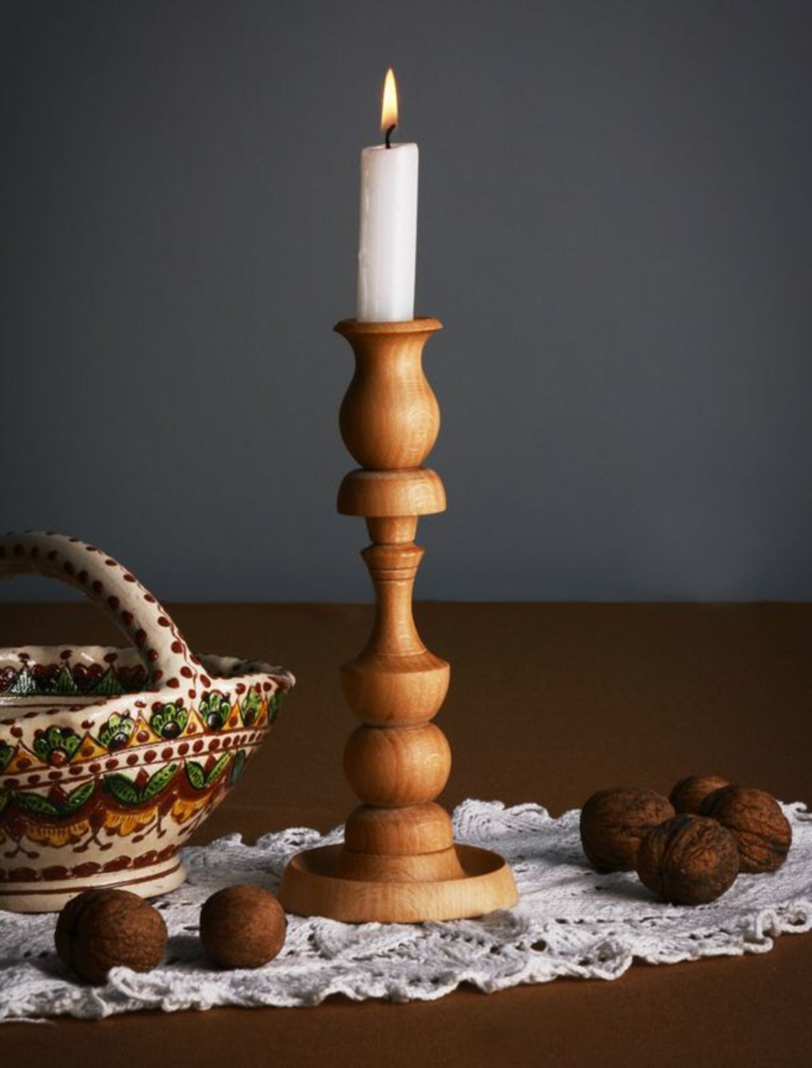 Carved wooden candlestick photo 1