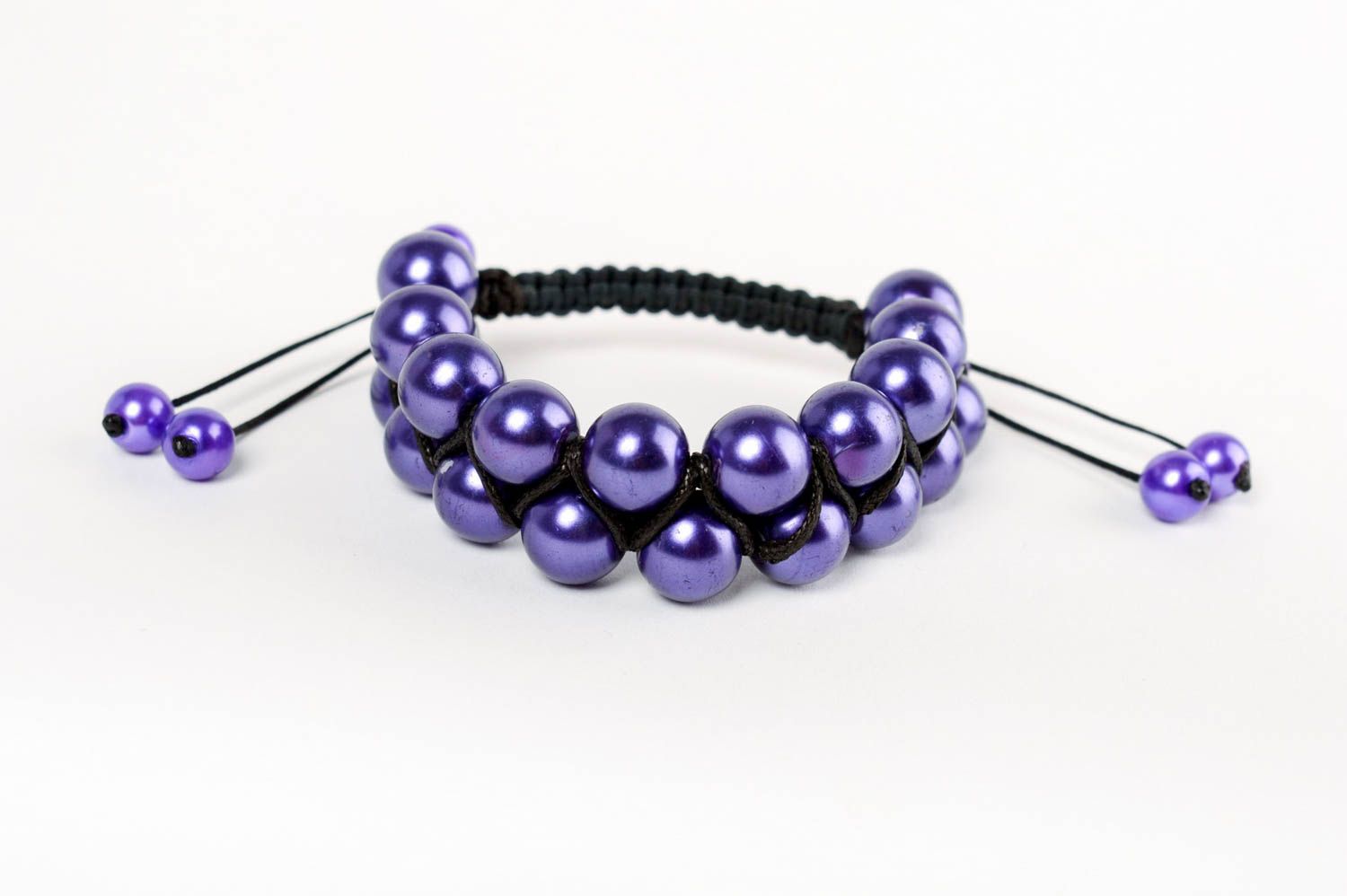 Handmade purple bracelet made of ceramic pearls and lace using macrame technique photo 2