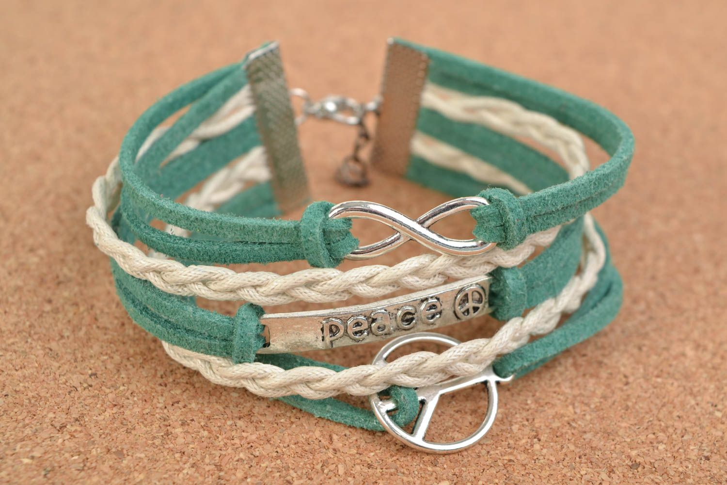 Handmade woven suede cord bracelet with metal charms for women photo 1