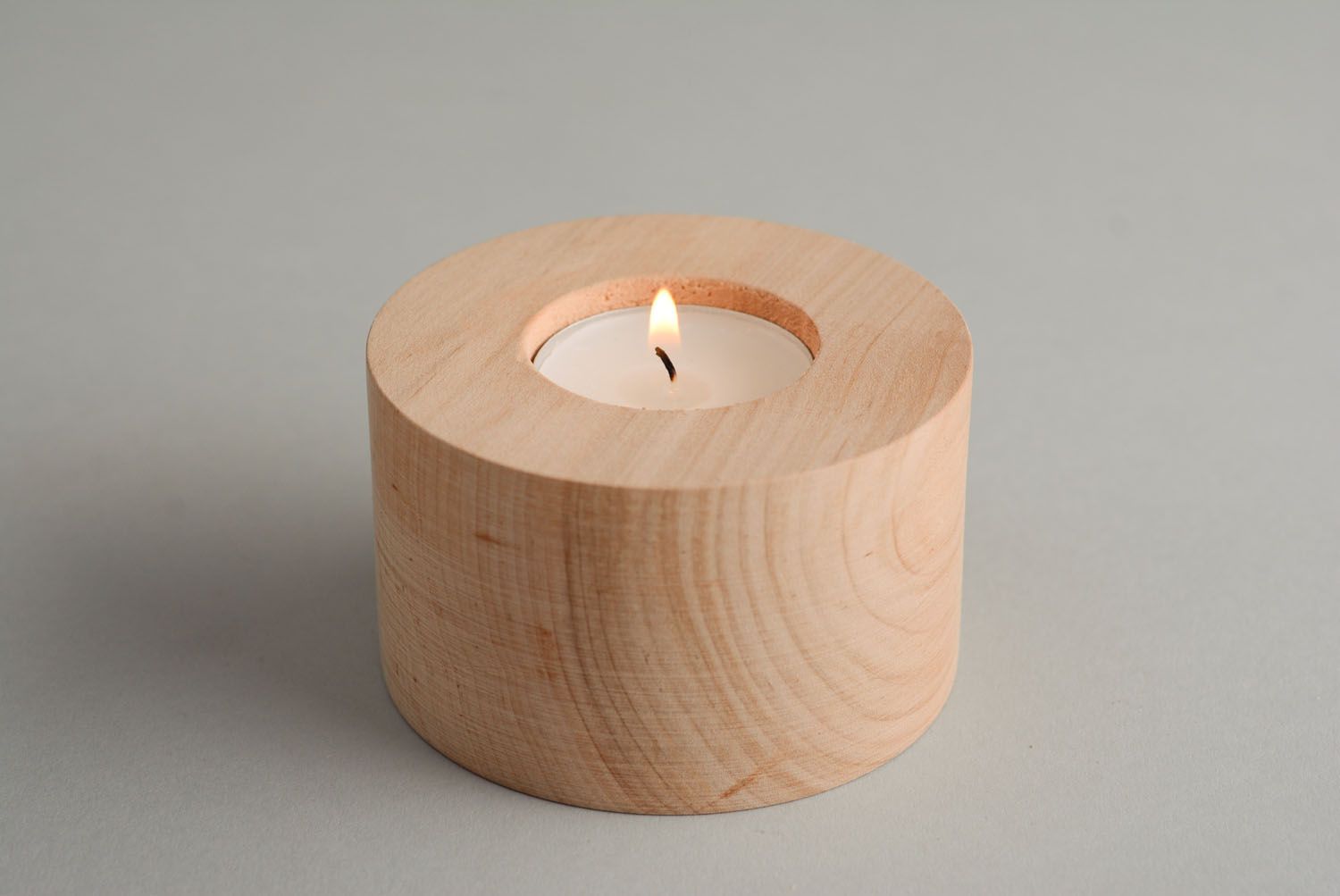 Stand for candle made of wood photo 1