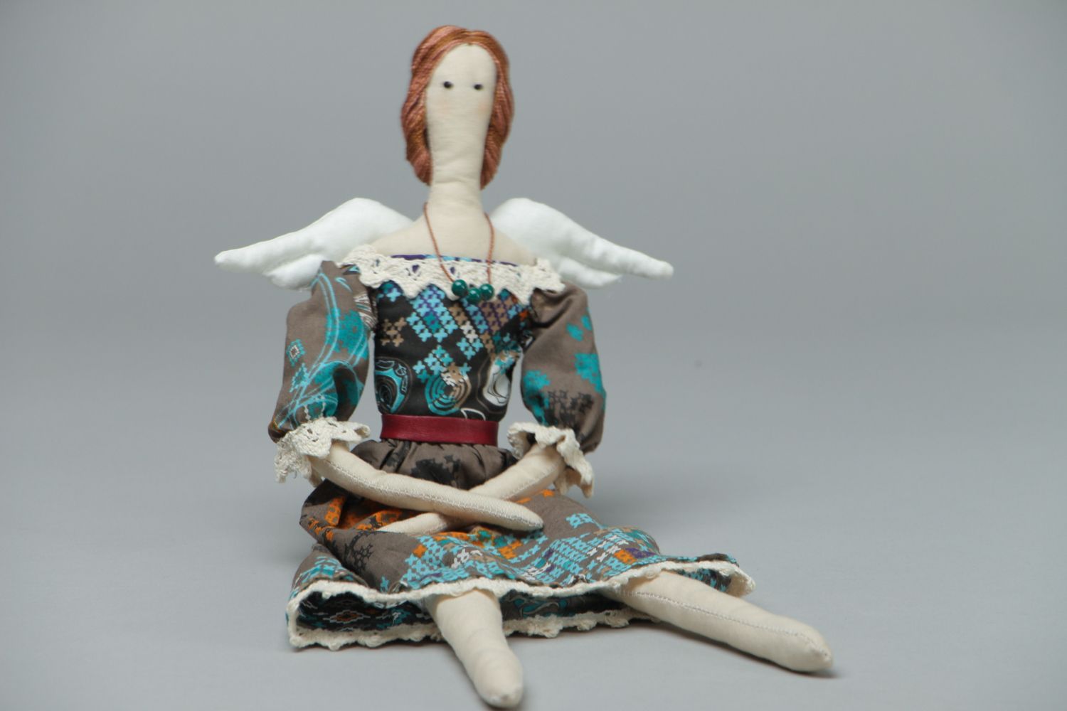 Muñeca de tela artesanal foto 1