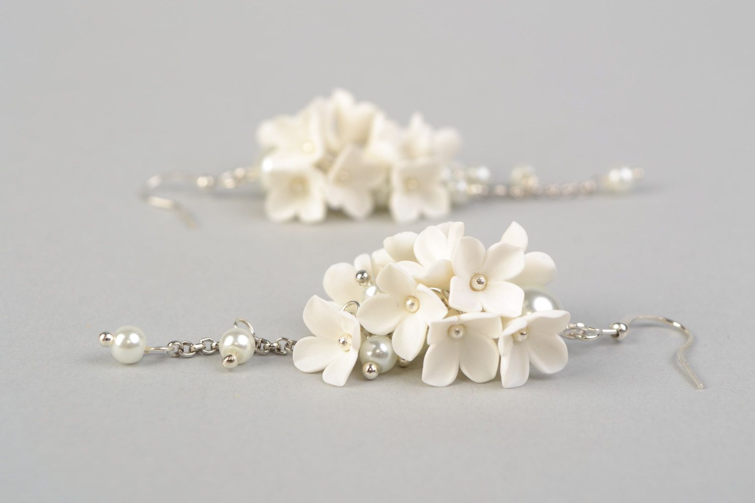 Handmade wedding dangling earrings with white polymer clay flowers and glass beads photo 5