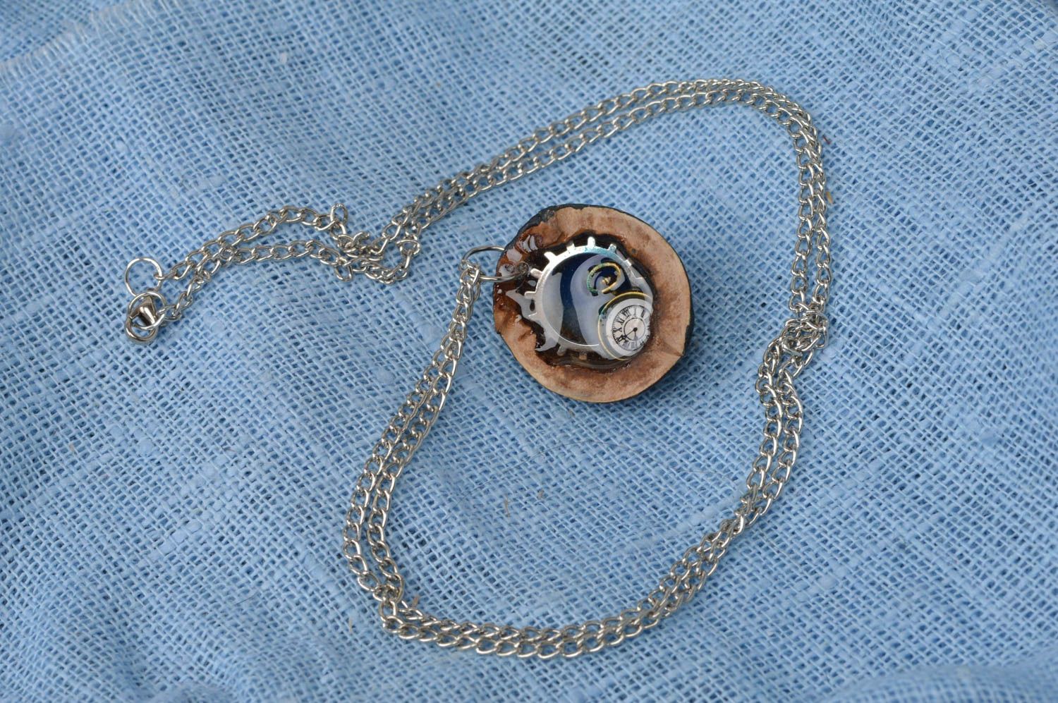 Unusual handmade glowing in the dark neck pendant with nutshell on long chain photo 1