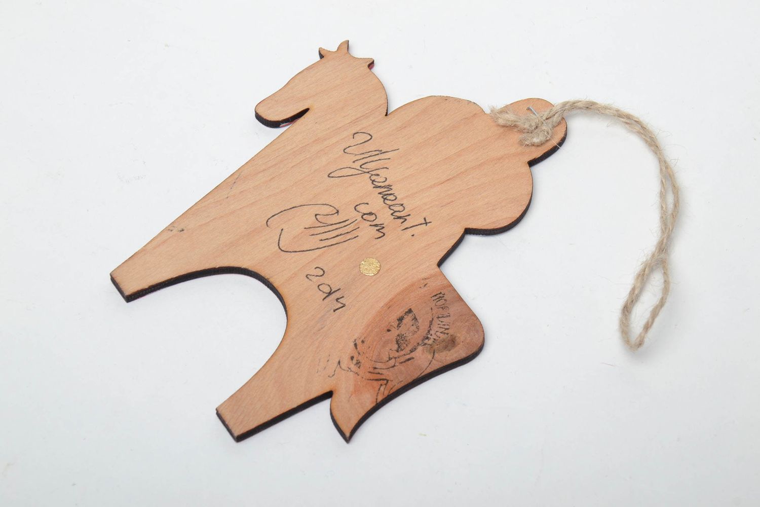Wooden interior pendant in the shape of a guy riding a horse photo 5