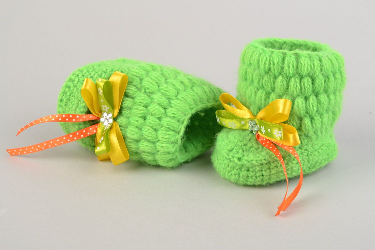 Light green hand-crocheted beautiful baby booties made of angora threads with bows photo 1