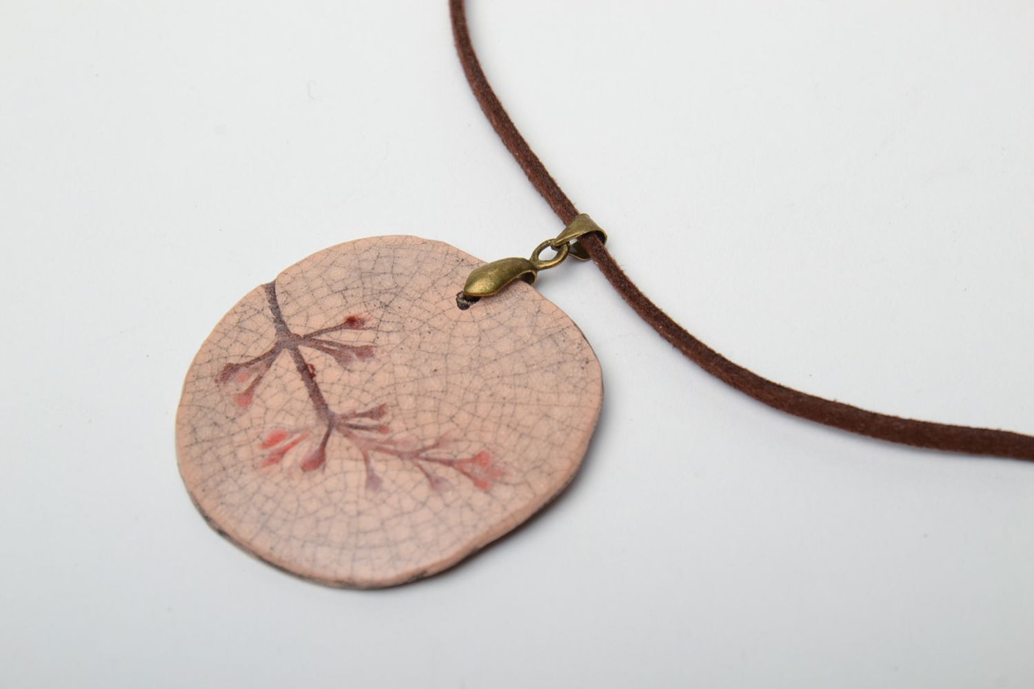 Handmade round pendant with floral stamps photo 3