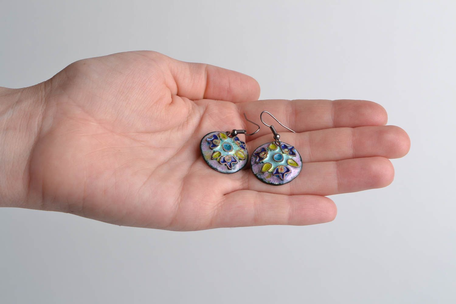 Handmade round shaped enameled copper dangling earrings in blue color palette photo 2