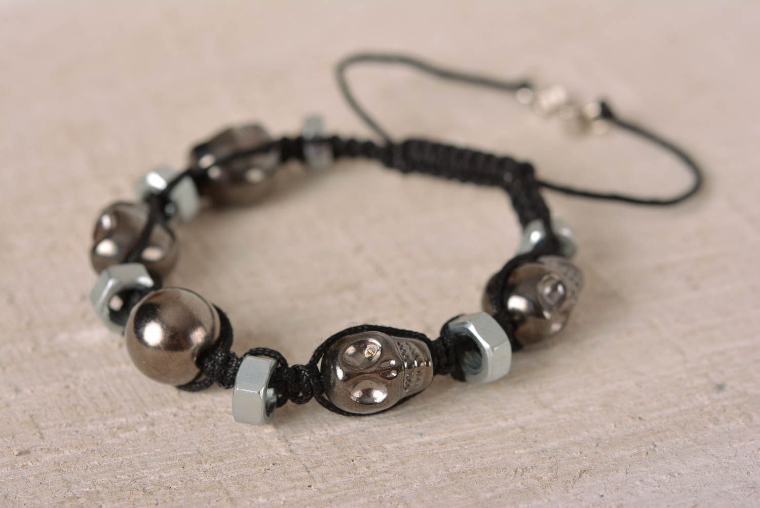 Handmade silver skull color beaded black cord bracelet with female screws photo 1